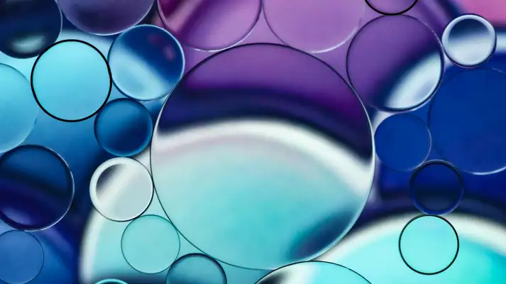 3D Circles look like magnifying glasses in different shades of blue and greeen