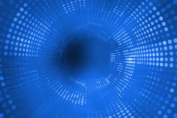 Blue circle with digital dots like its zooming into something